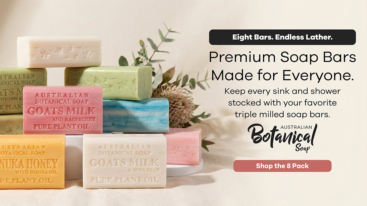 Collection of 8 Australian Botanical Soap bars in a variety of fragrances with a native botanical plant on a white background.
