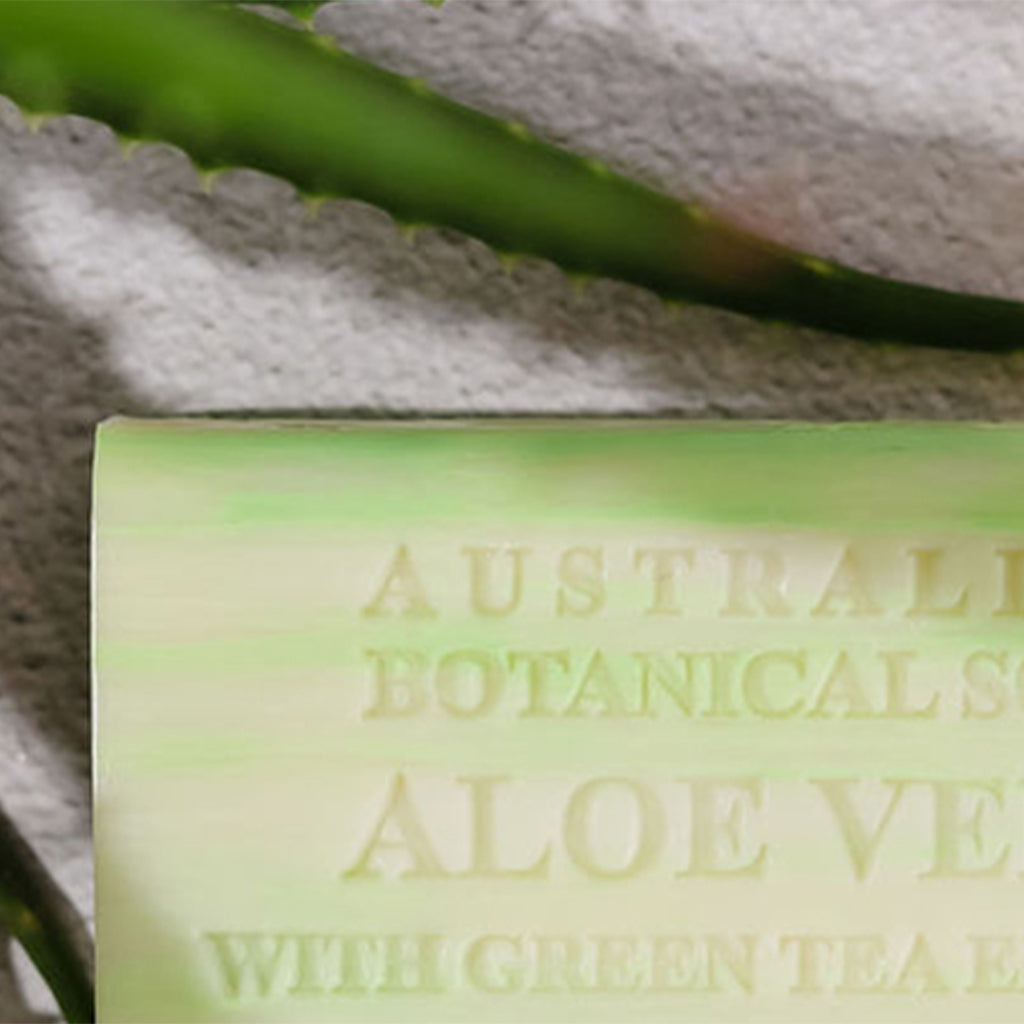 Bar of soap with 'Australian Botanicals' branding on a textured surface