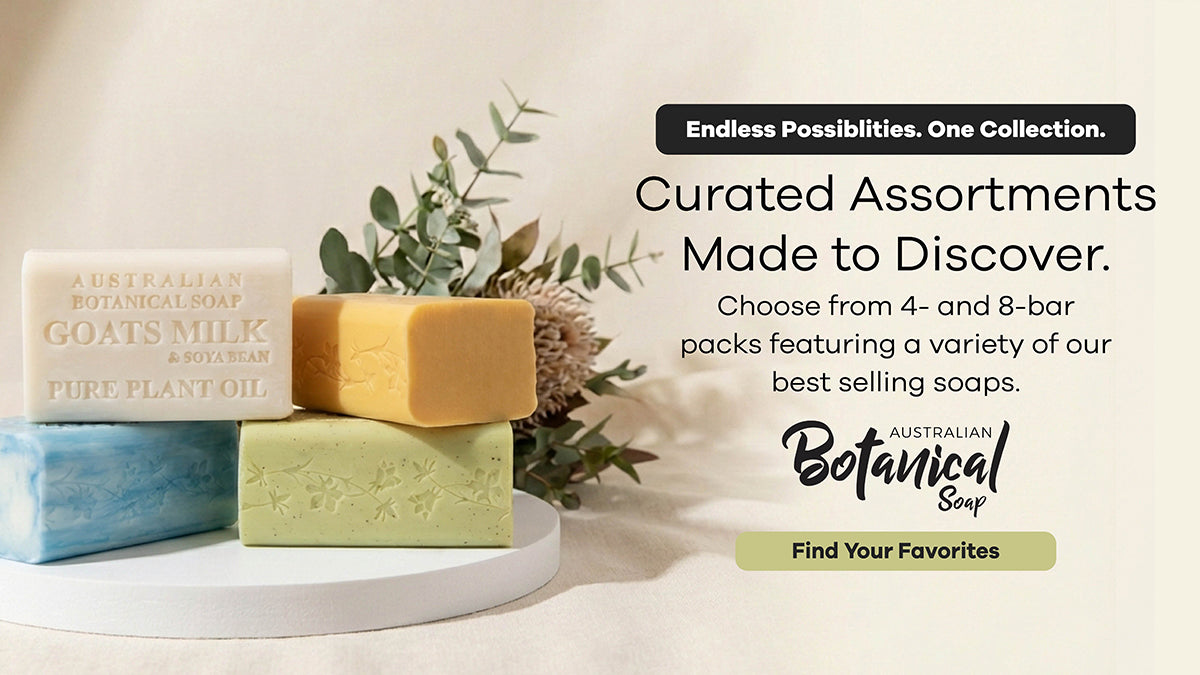 Four bars of soap on a white stand with text about Australian Botanical Soap assortments