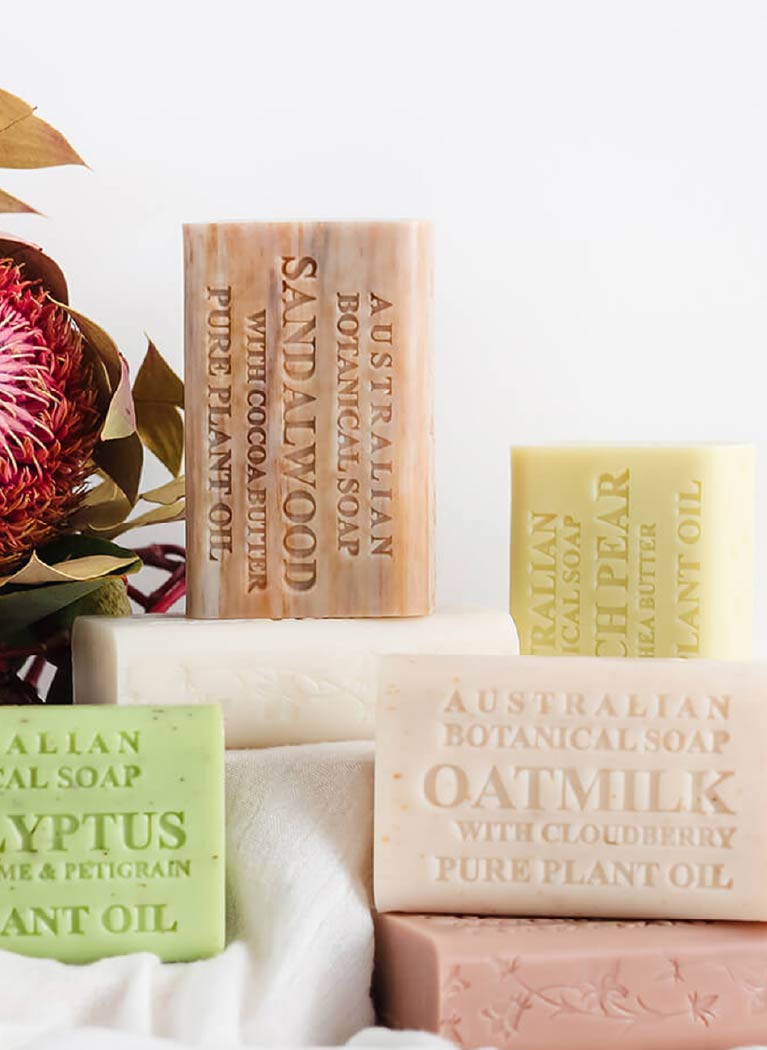 Collection of Australian Botanical Soap bars with visible branding on a white background.