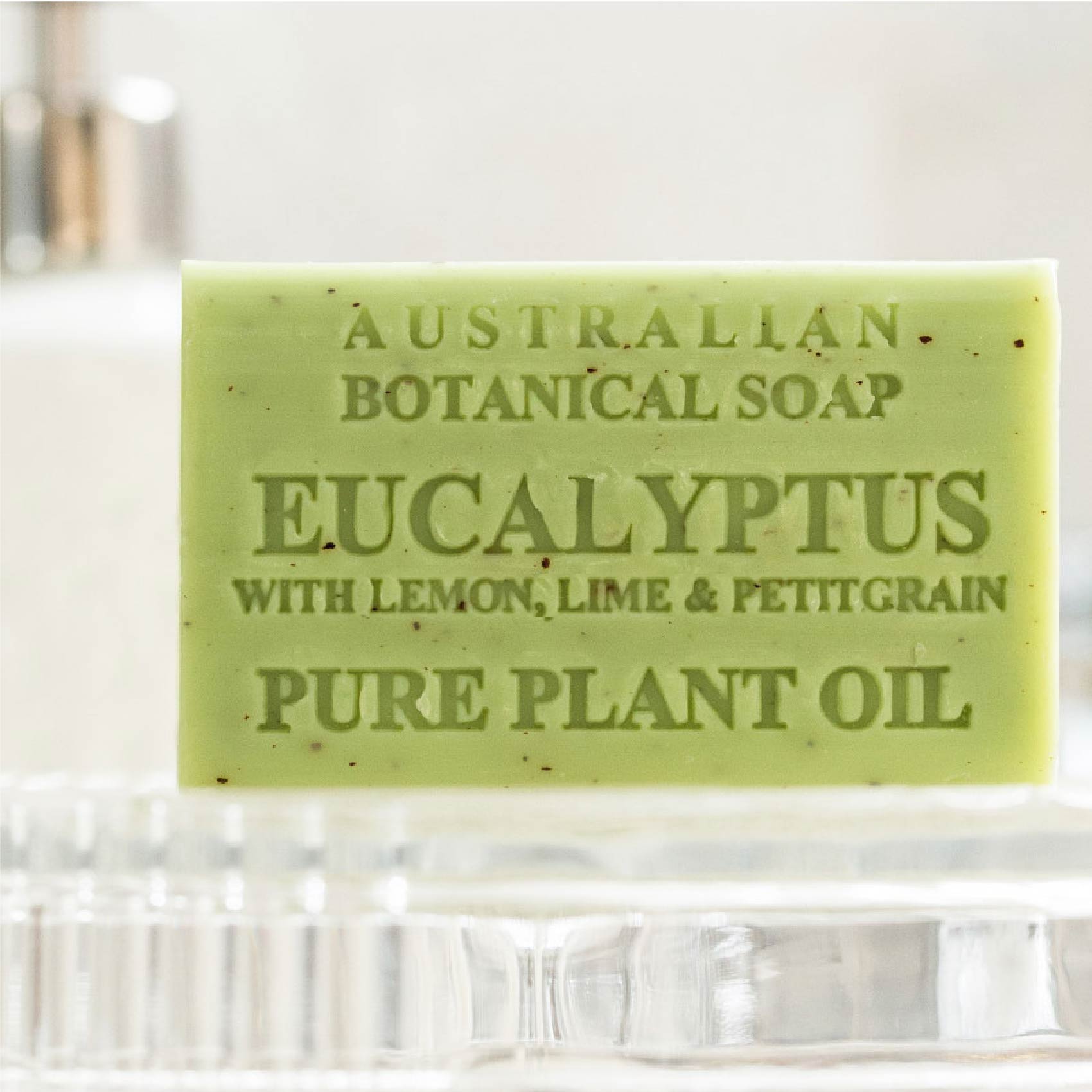 Green bar of Australian Botanical Soap with eucalyptus scent on a white background
