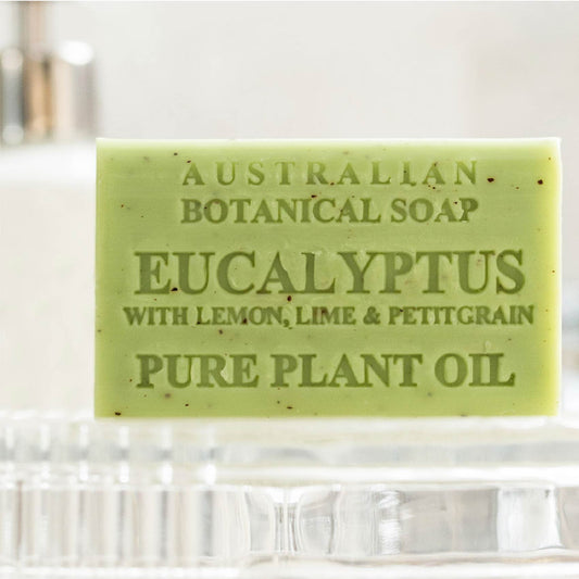 Green bar of Australian Botanical Soap with eucalyptus scent on a white background