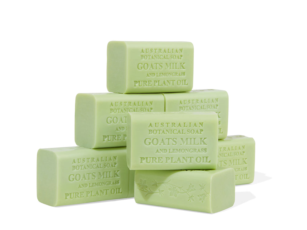 Stack of green soap bars with 'Australian Botanical Soap' branding on a white background