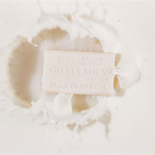 Goats Milk & Soya bean soap bar splashing into milk