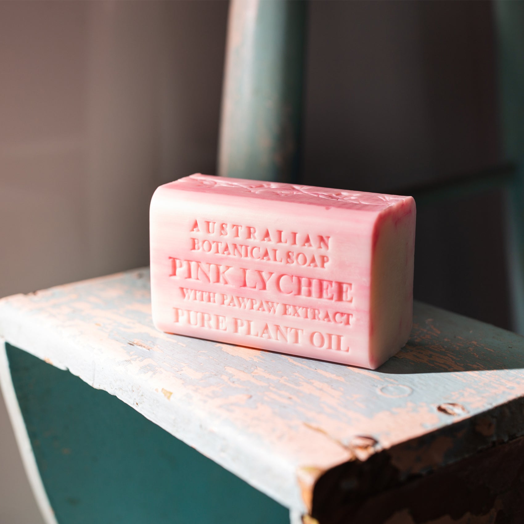 Bar of Australian Botanical Soap Pink Lychee on a wooden surface