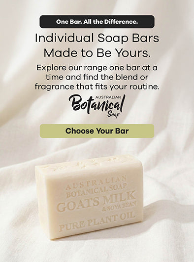 Australian Botanical Soap bar on a white fabric background with promotional text.
