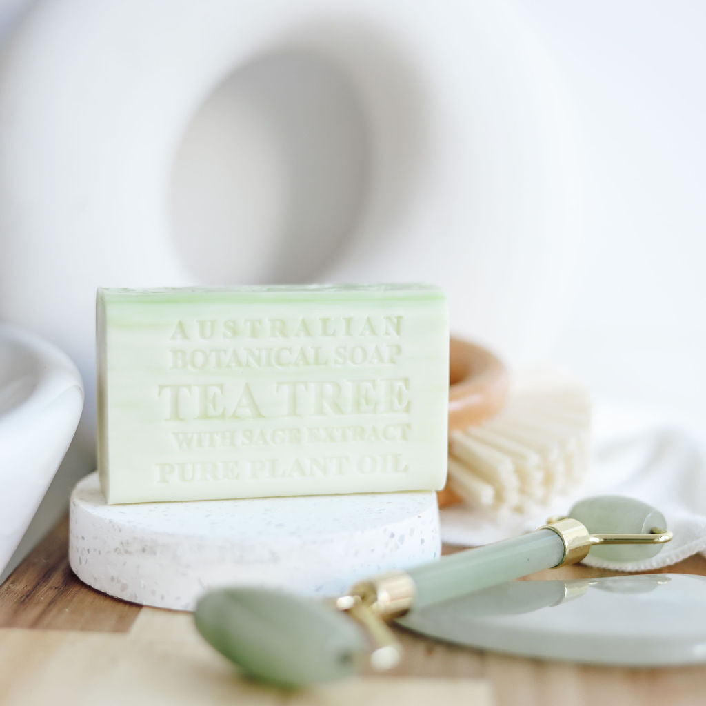 Bar of soap with a label on a white surface with a blurred background