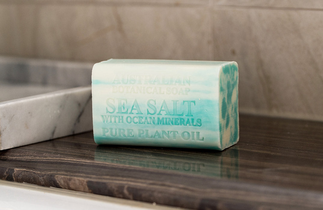 Bar of soap with text on a marble surface