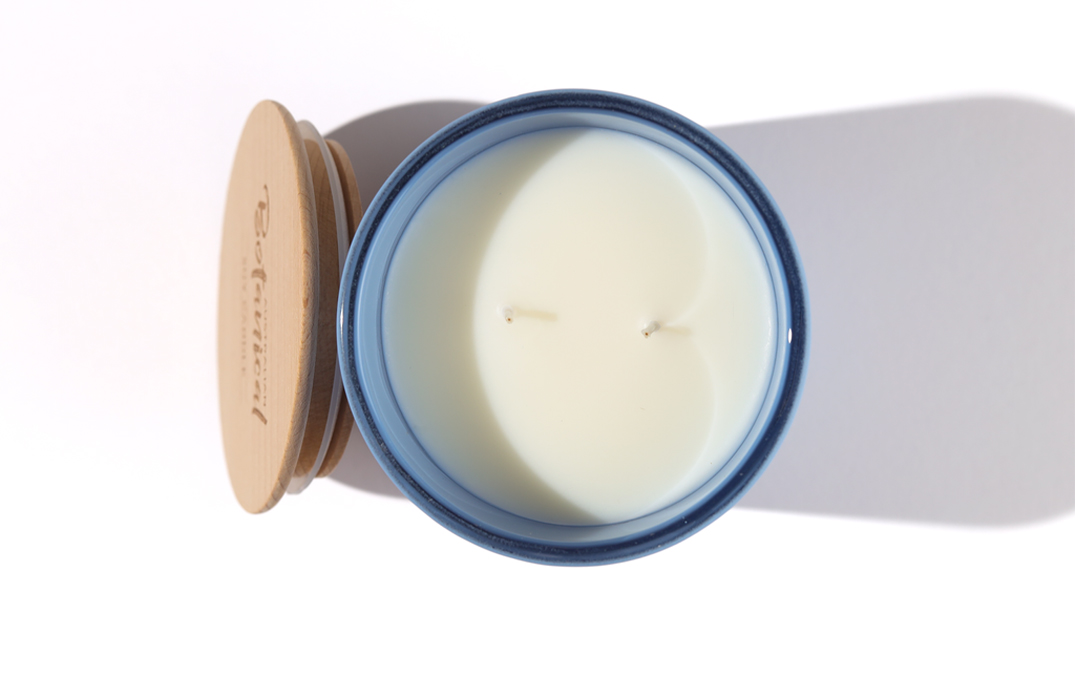 Aqua Escape Soy Candle overhead shot with wooden lid off and to the side