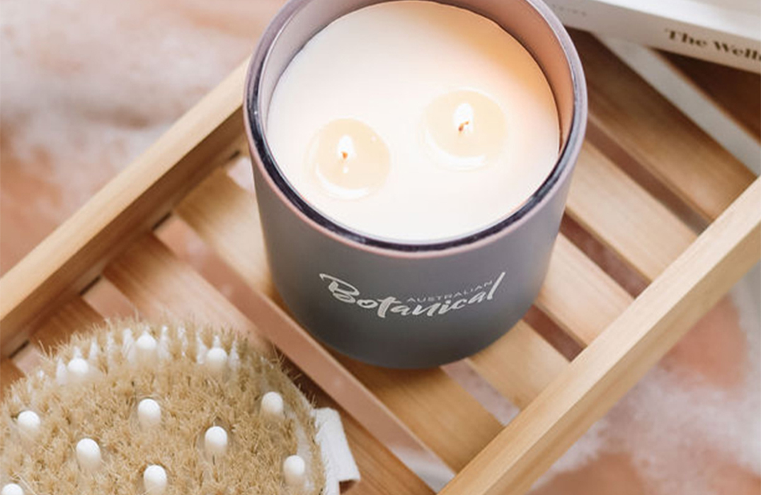 Coconut with Lime Soy Candle on wooden shelf